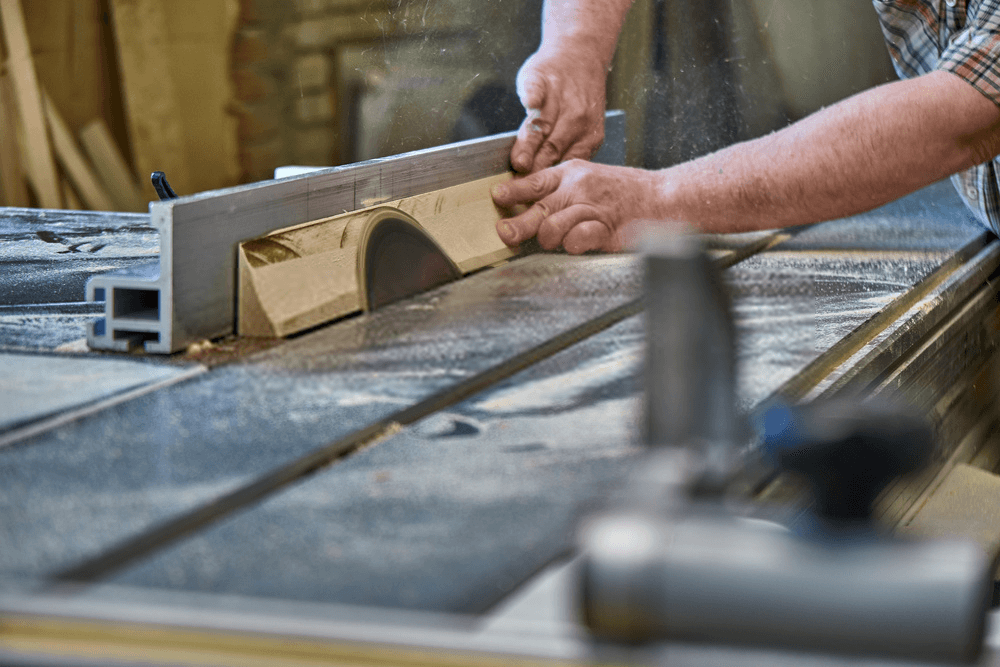 A cutting wood with table saw A cutting wood with table saw