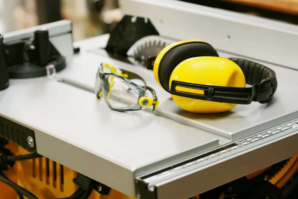 table-saw-safety Earmuffs and Safety glasses on Table saw